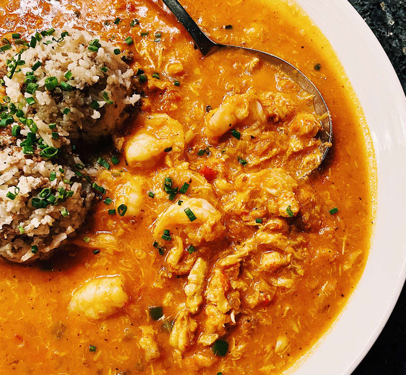 Photo of butter chicken dish with spoon