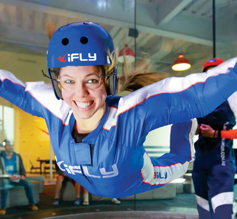woman indoor skydiving at ifly