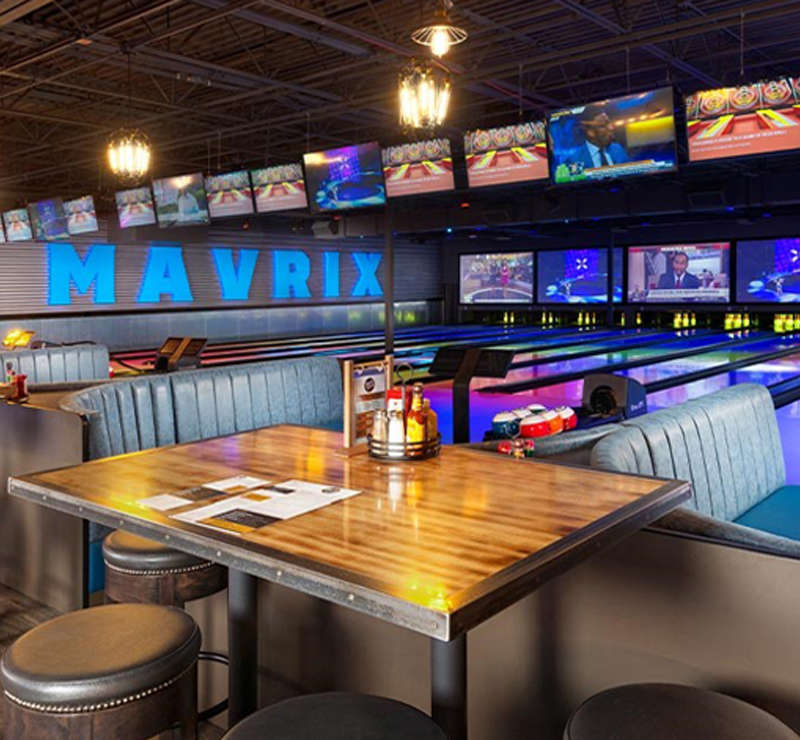 booths and tables at bowlero mavrix bowling