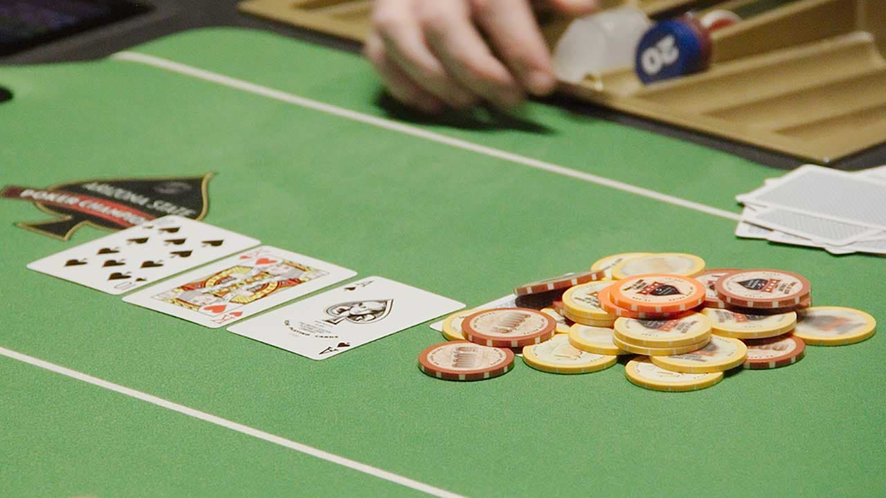 Poker Promo - Poker Chips on the table with a set of cards